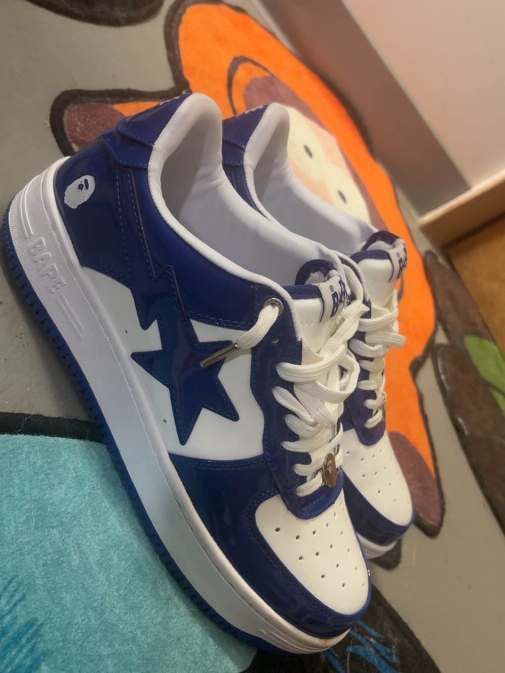 Bape Blue & White Leather Star Sneakers
Size 13